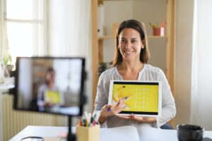 Woman teacher teaching online, coronavirus and online distance learning concept.